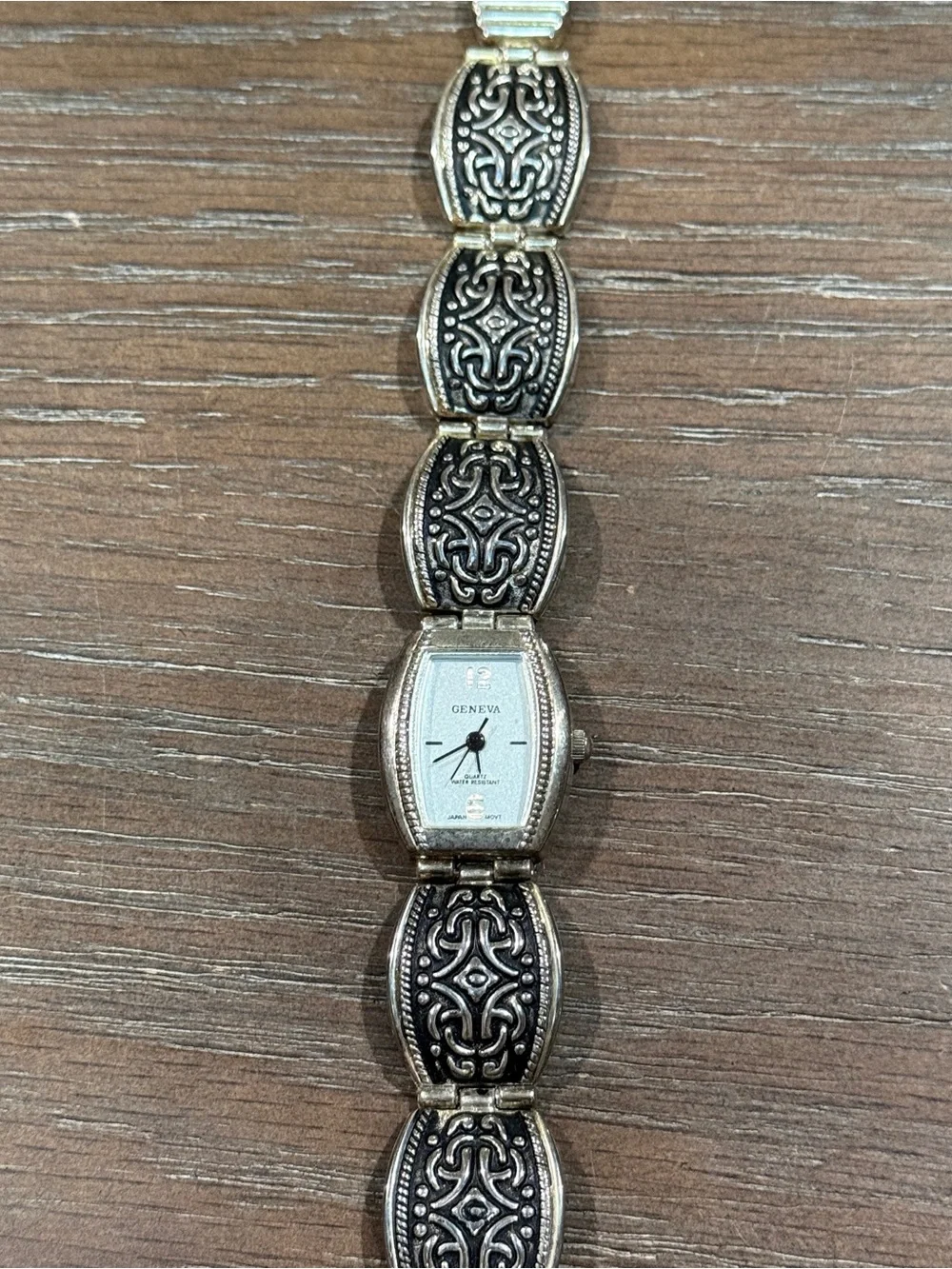 Vintage Geneva stainless steel back waterproof silver tone bracelet watch